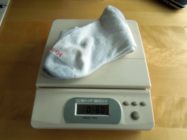 How Much Does a pair of mens athletic socks weigh?